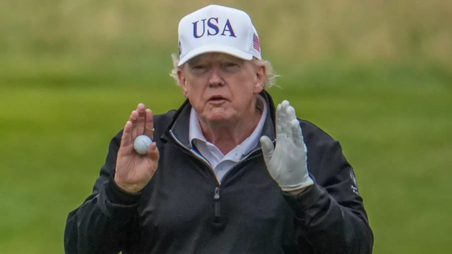 Donald Trump caught 'cheating' at golf on visit to UK as footage of caddie helping US President goes viral