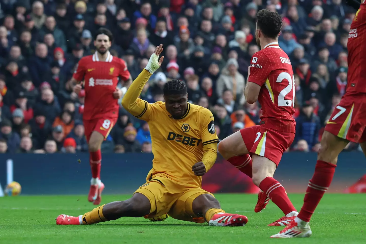 VAR overturned Simon Hooper's decision after reviewing the Diogo Jota incident. Image: Getty