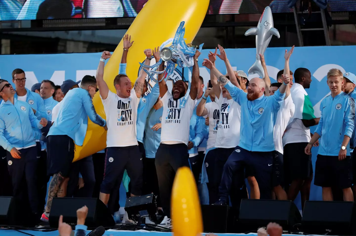 Raheem Sterling lifts the Premier League trophy (REUTERS / Alamy)