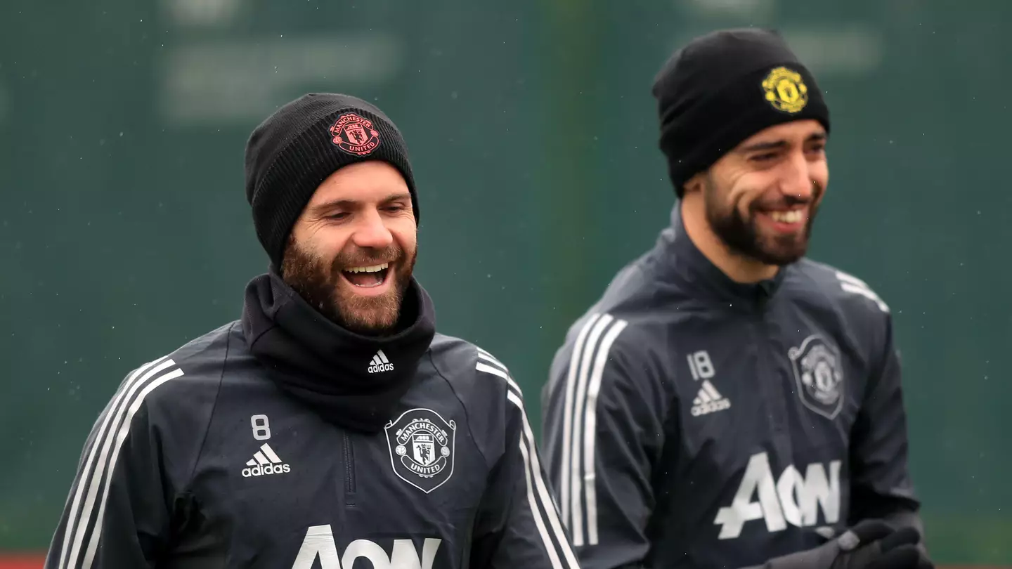 Bruno Fernandes and Juan Mata laugh in training. (Alamy)