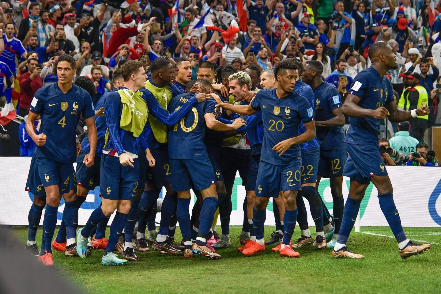 France players celebrate with Mbappe after his first equaliser. (Image