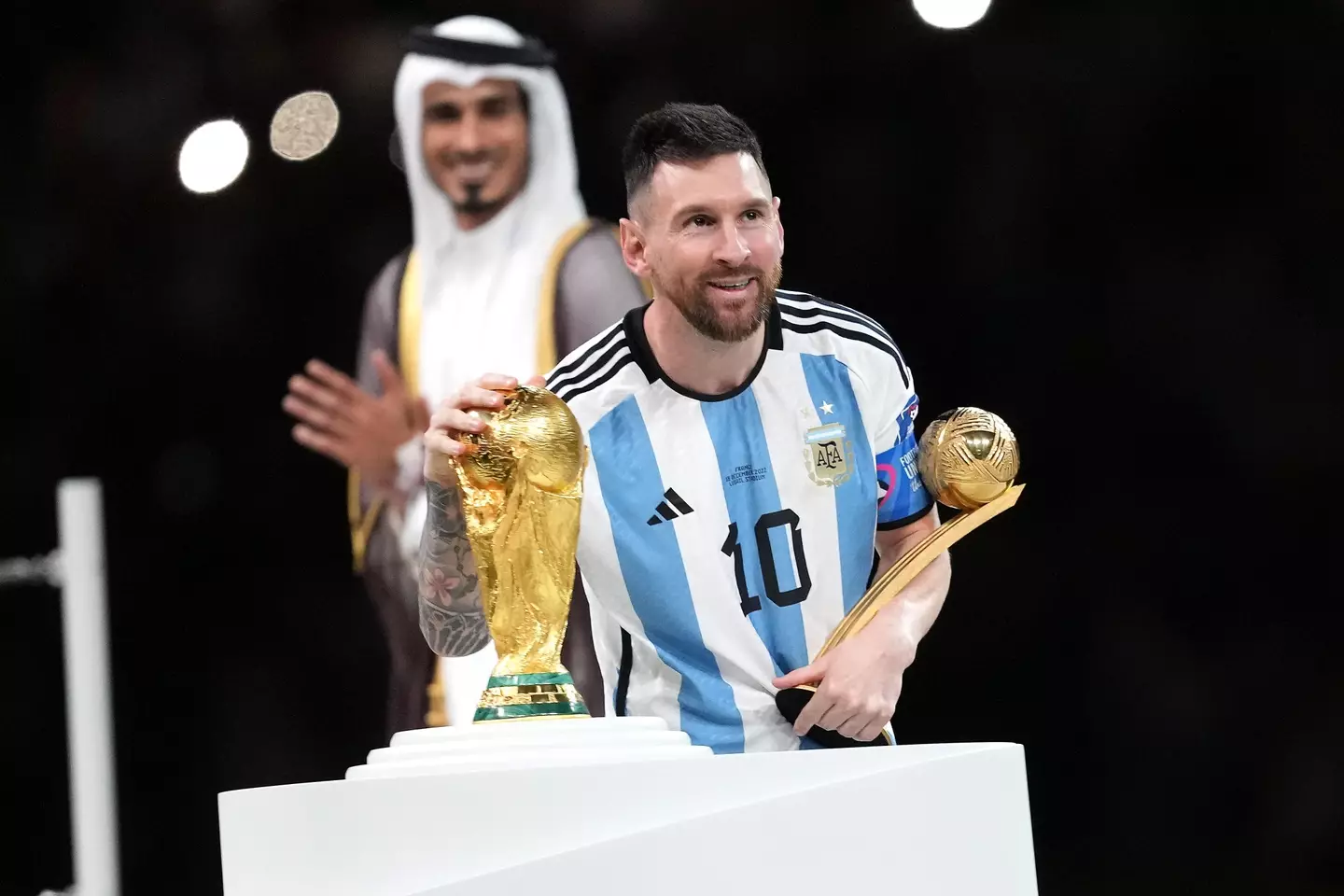Messi with the World Cup. (Image