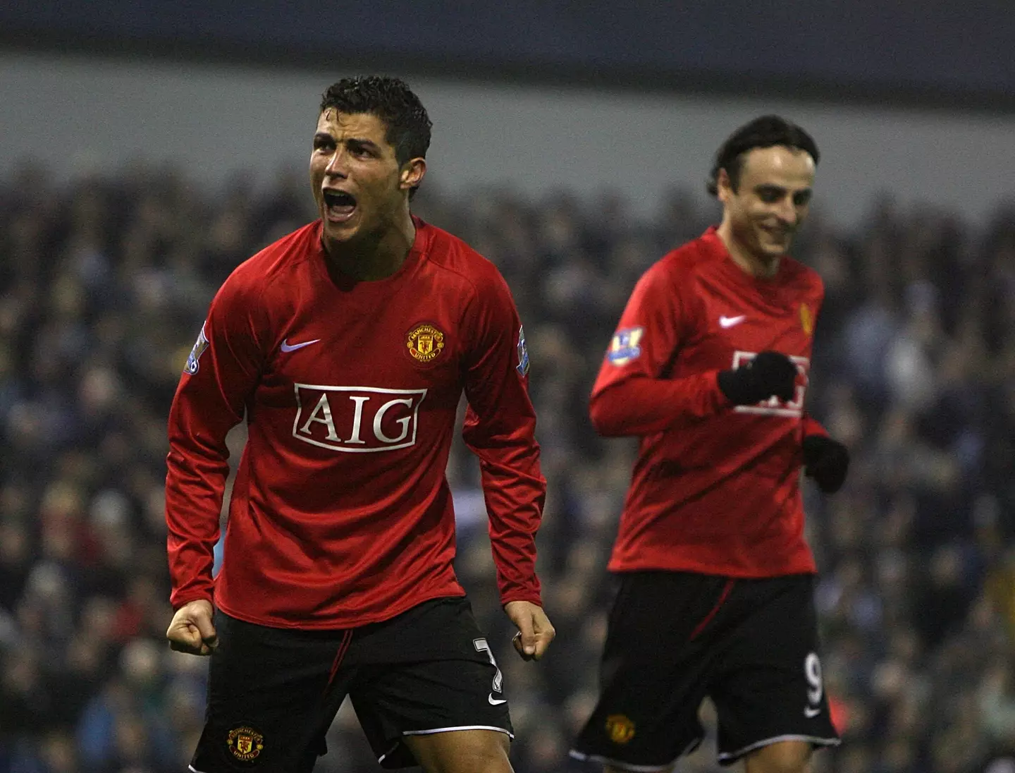 Berbatov and Ronaldo celebrate another goal during their time at United.