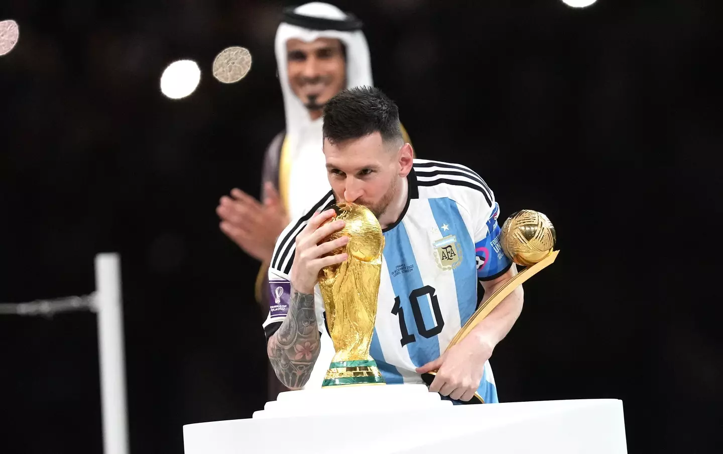 Messi with the World Cup trophy. (Image