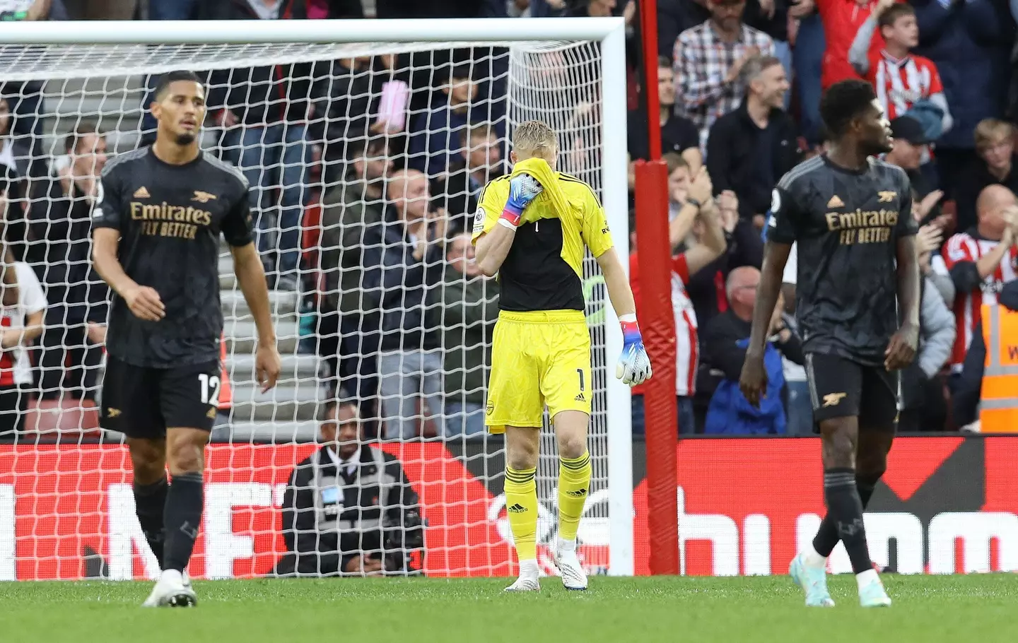 Arsenal players look dejected after Armstrong's goal. Image: Alamy