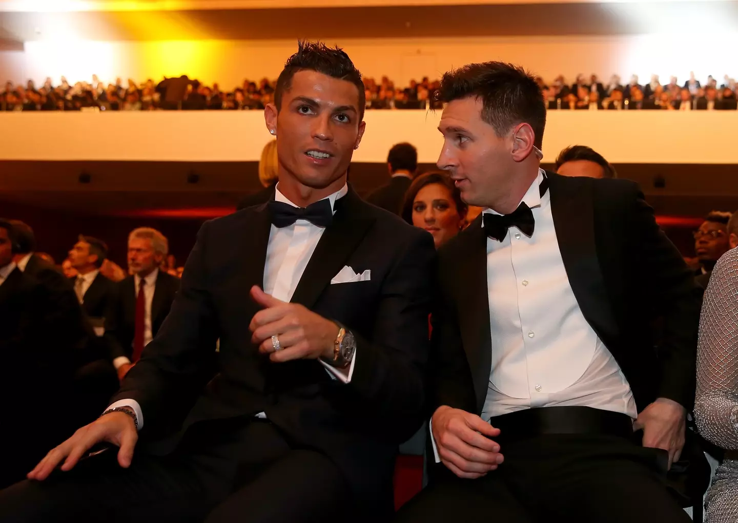 Ronaldo and Messi at an awards ceremony (