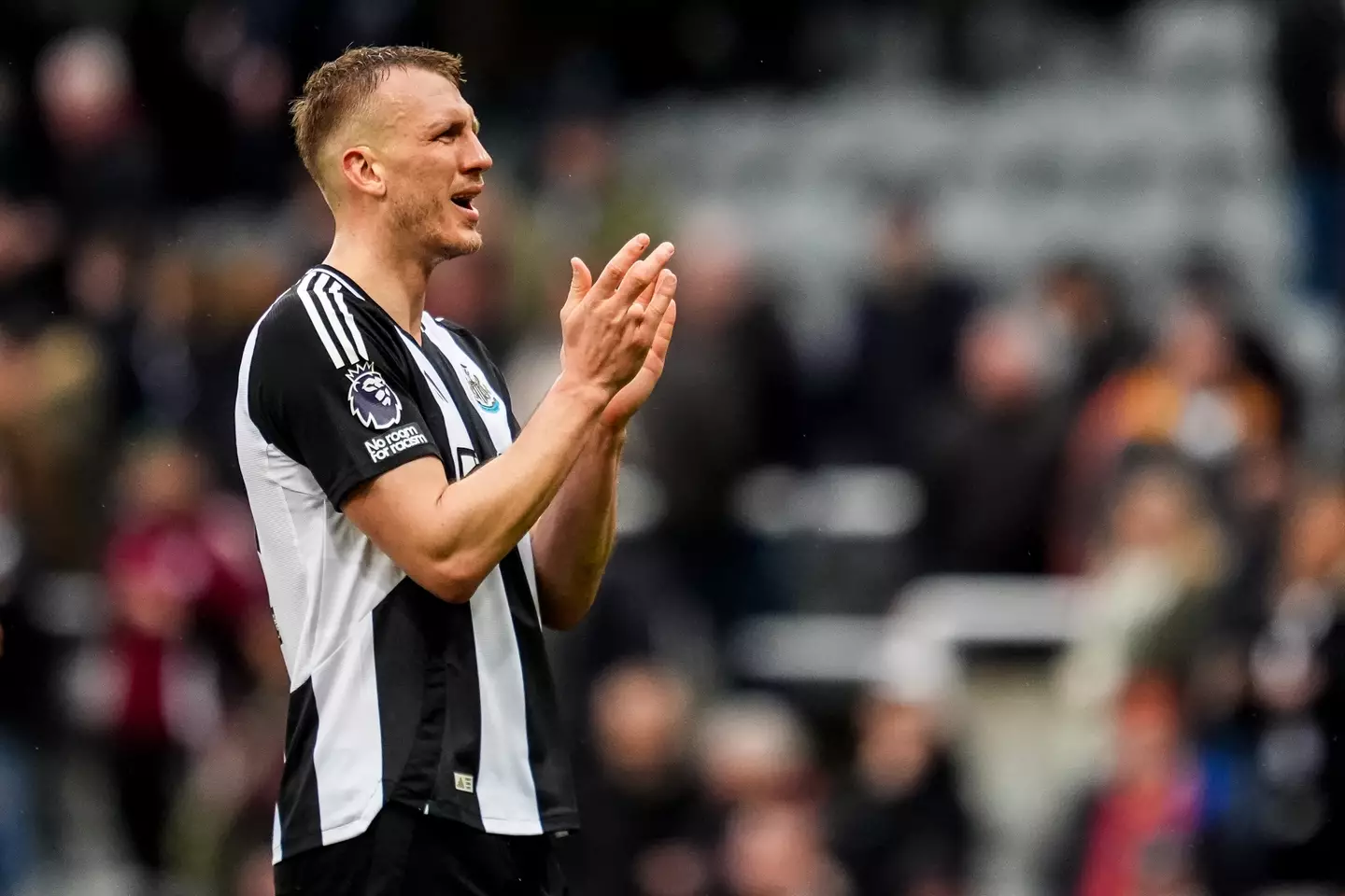 Dan Burn is missing his ring finger on his right hand. Image: Getty