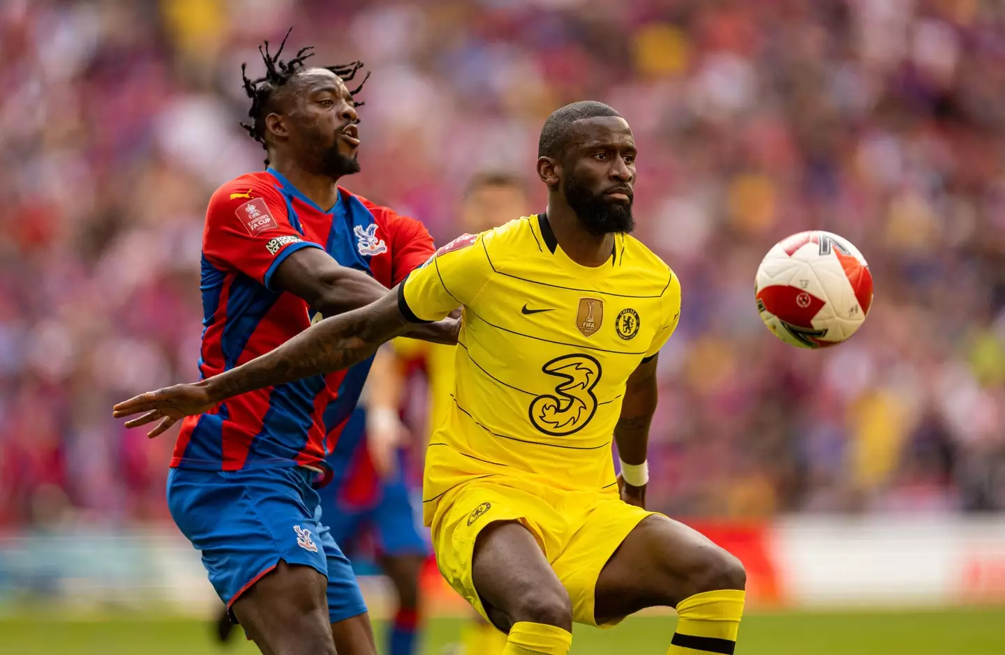 Rudiger shields the ball from Jean-Philippe Mateta during Chelsea vs Crystal Palace. (Image