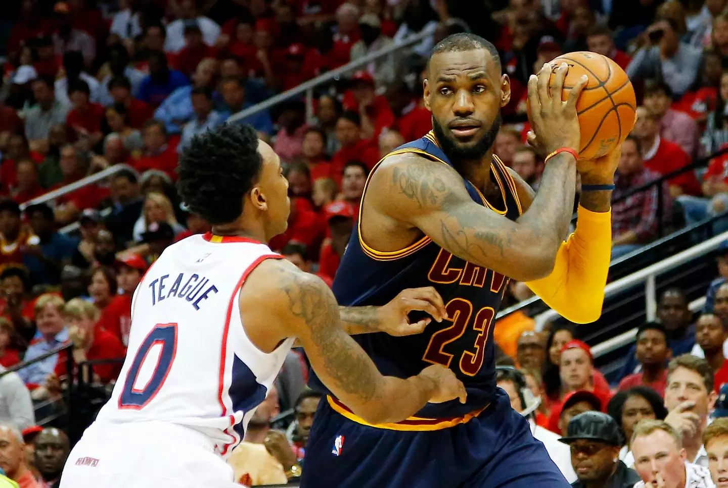 Jeff Teague and LeBron James during an NBA game. Image: Getty