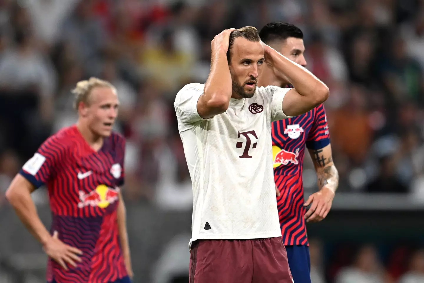 Harry Kane cuts a dejected figure on his Bayern Munich debut. Image: Getty