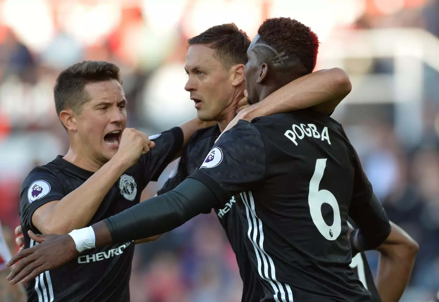 Paul Pogba and Nemanja Matic celebrate with ex-teammate Ander Herrera against Stoke City in September 2017 |