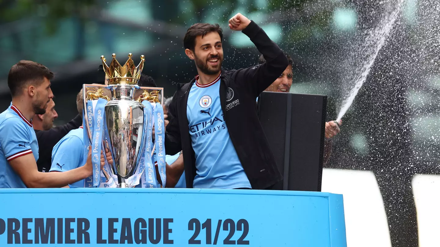 Bernardo Silva celebrates Manchester City's Premier League trophy success.
