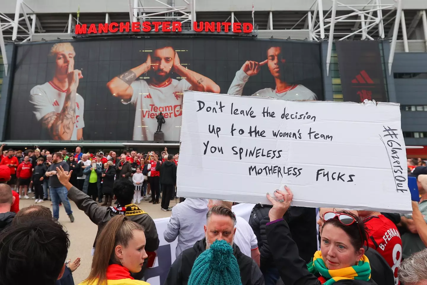 Manchester United fans holds up banner protesting against Mason Greenwood Image: Getty