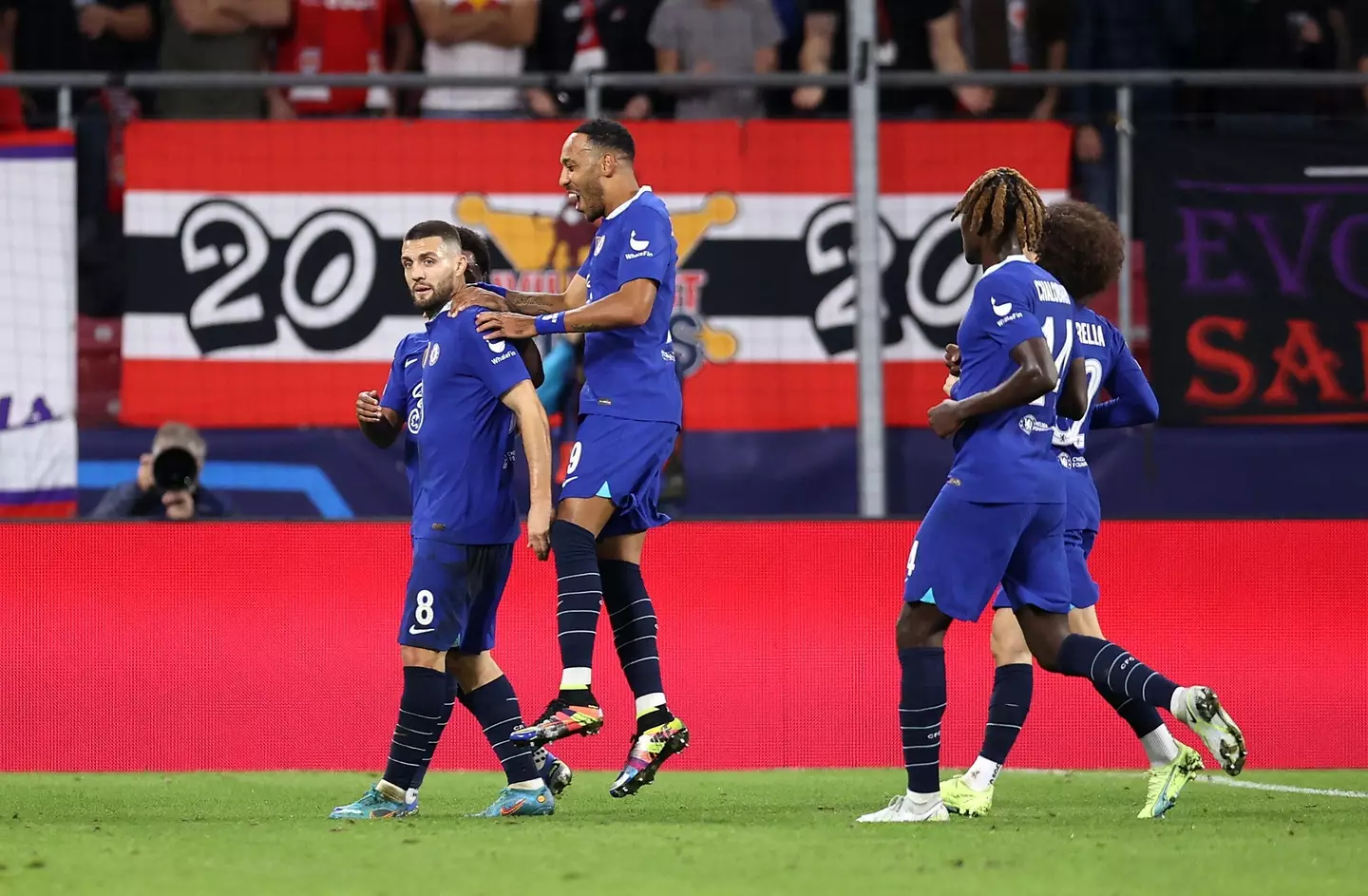 Chelsea's Mateo Kovacic (left) celebrates scoring their side's first goal of the game with team-mates during the UEFA Champions League group E match at the Red Bull Arena. (Alamy)