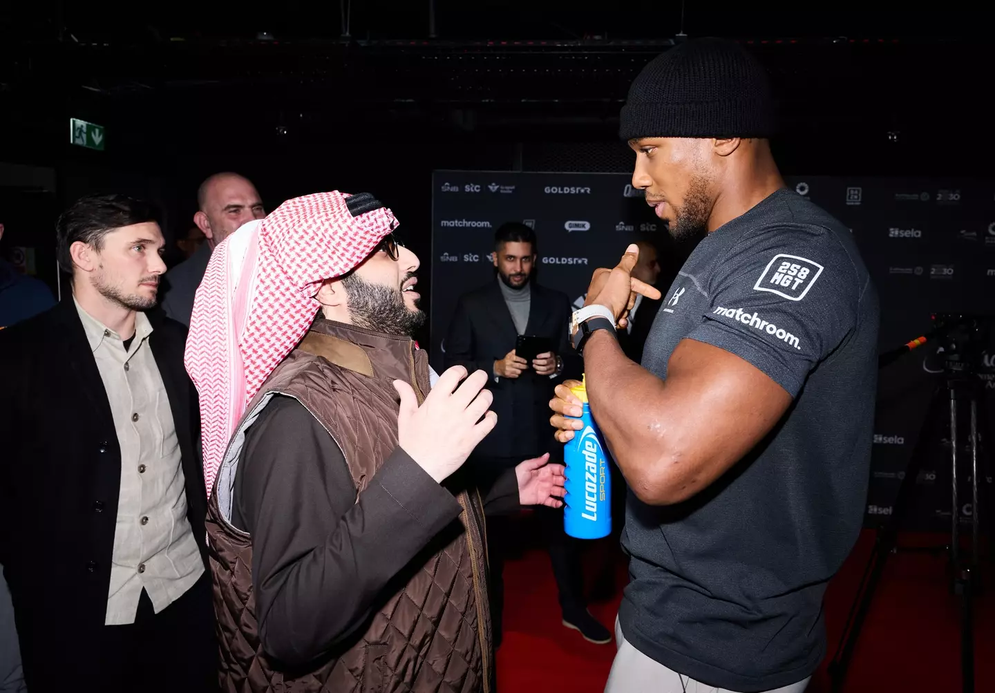 Turki Alalshikh speaks to Anthony Joshua. Image: Getty 