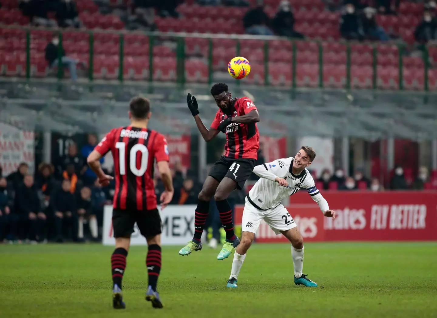 Tiemoue Bakayoko in an aerial challenge for AC Milan against Spezia Calcio. (Alamy)