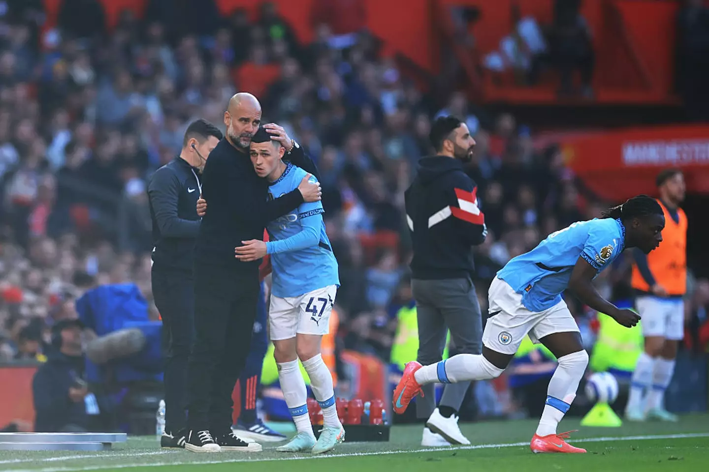Phil Foden is embraced by Pep Guardiola (Credit:Getty)