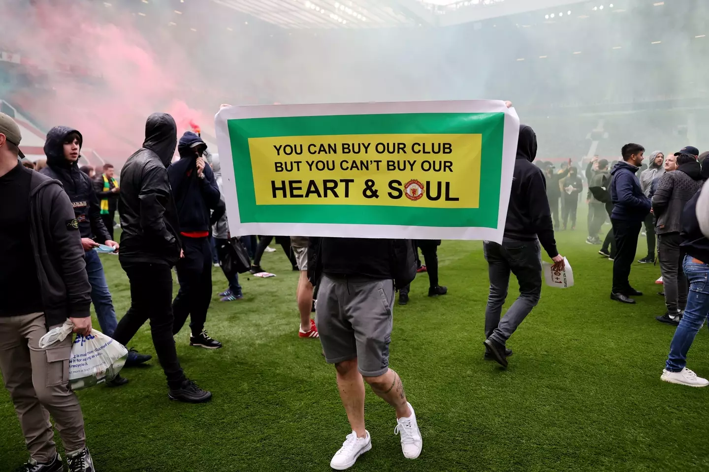 Manchester United fans managed to get onto the Old Trafford pitch in May 2021. (Image