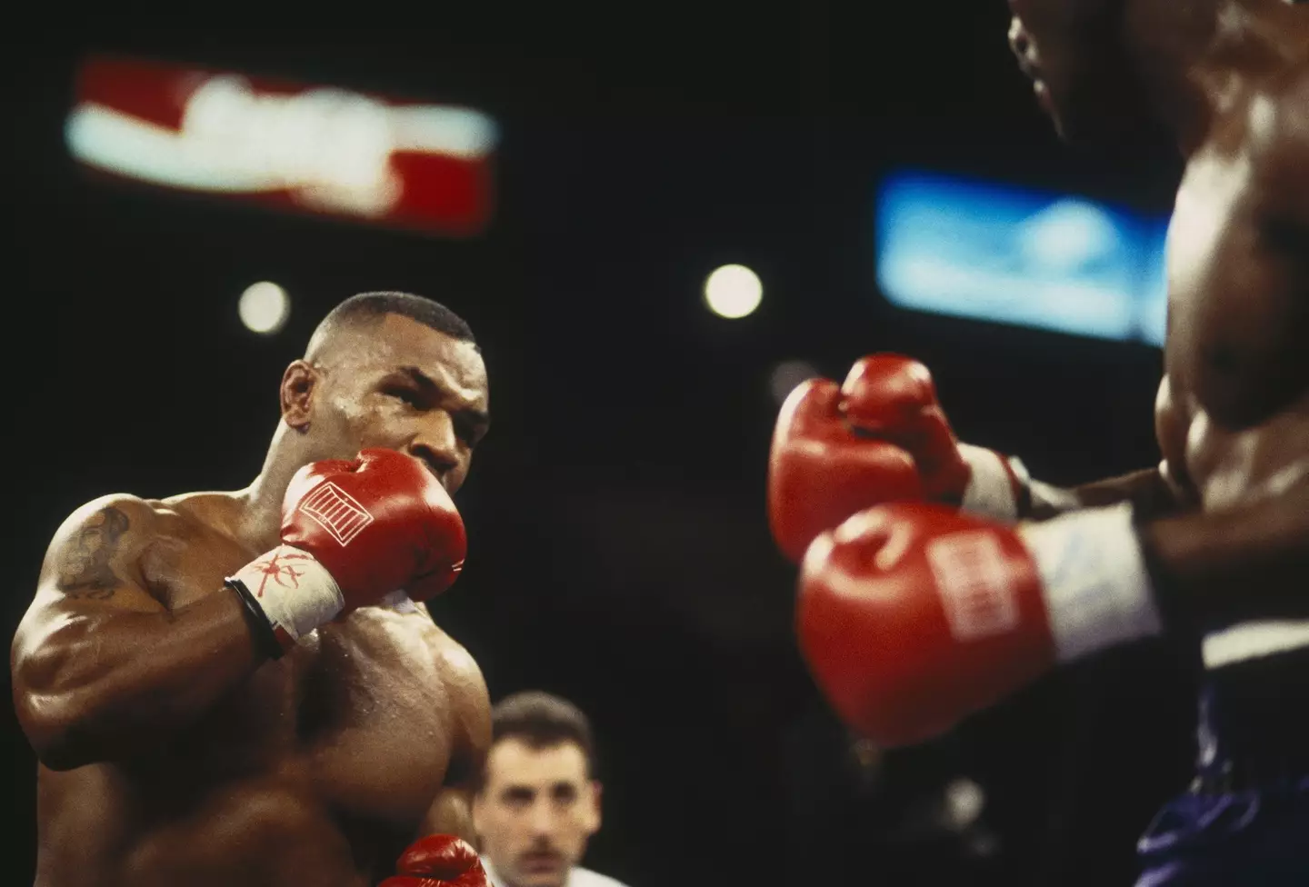 Mike Tyson in action against Evander Holyfield. Image: Getty 