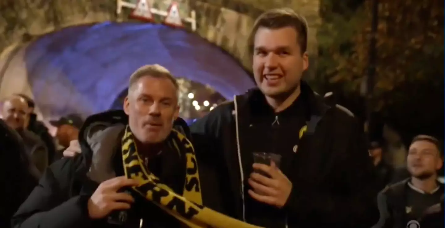 Jamie Carragher walked to the Etihad with the Dortmund fans. Image credit: CBS Sports