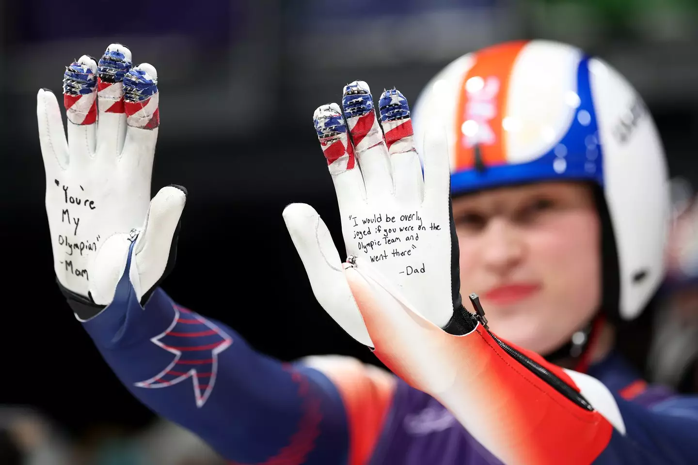 Kirkby had hand-written notes from her parents on her gloves at the Winter Olympics (Image: Getty)