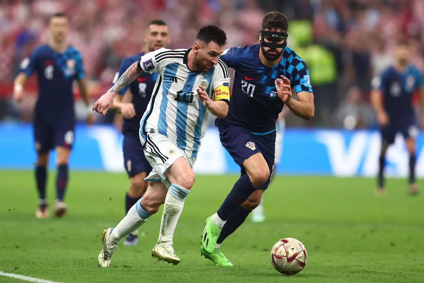 Messi taking on Gvardiol. (Image