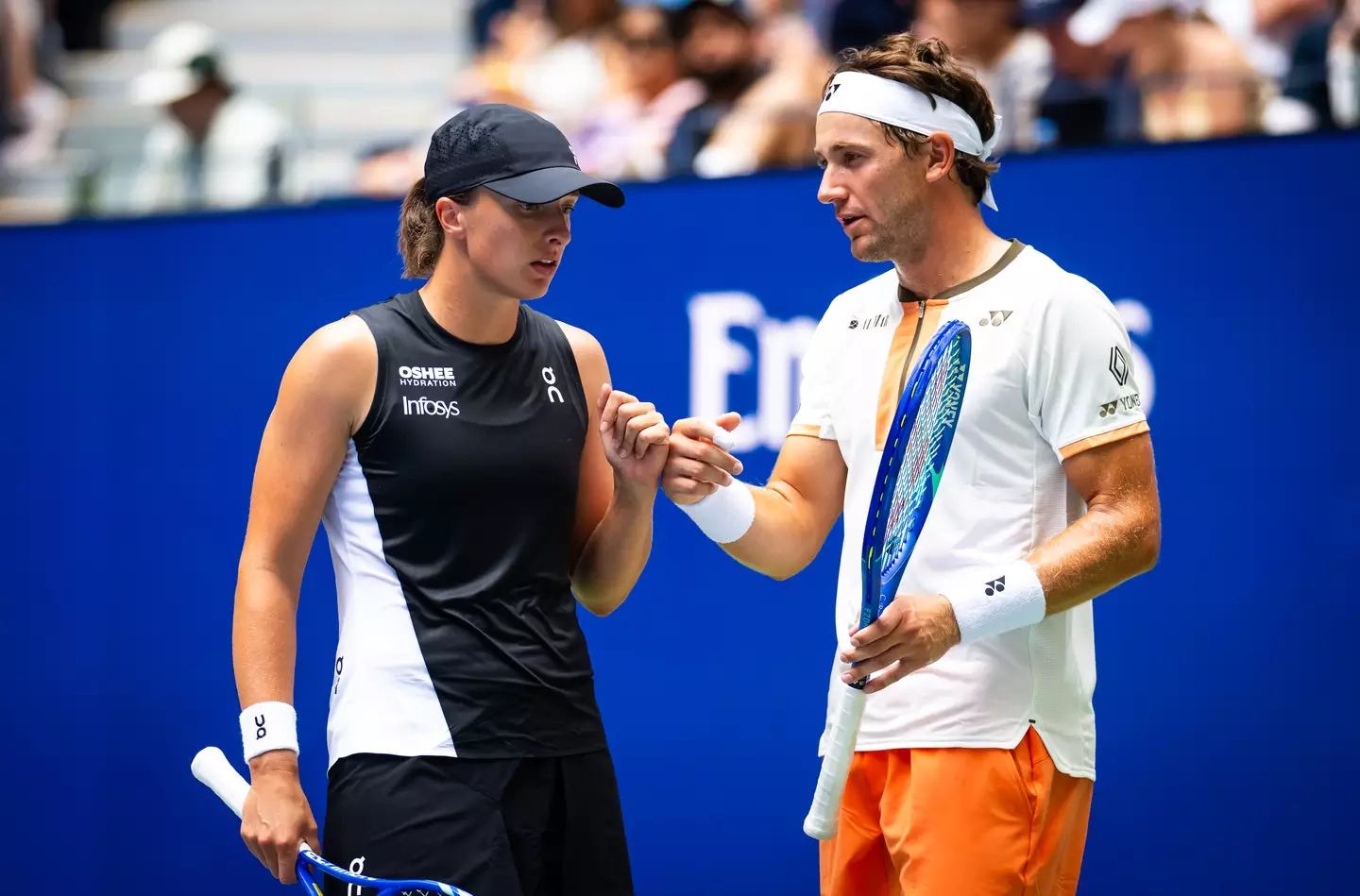 Iga Swiatek and Casper Ruud during the US Open mixed doubles tournament. Image: Getty