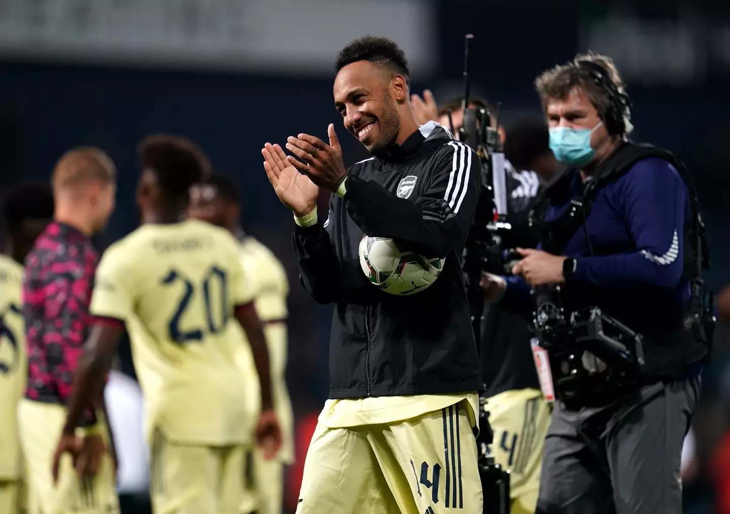 Hat-trick hero Aubameyang clutches the match ball. 