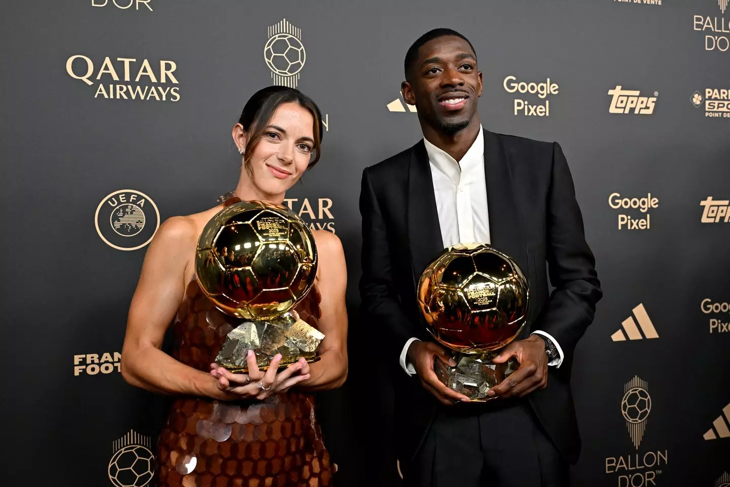 Aitana Bonmati and Ousmane Dembele pose for photos at the 2025 Ballon d'Or ceremony. Image: Getty