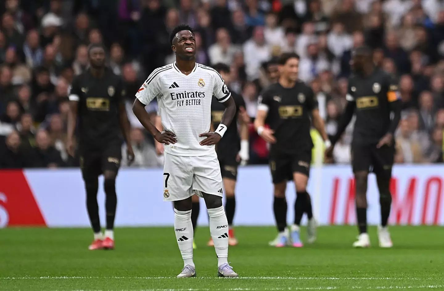 Vinicius Jr is at risk of missing the second leg of the Champions Leg clash with Arsenal. (Image: Getty)