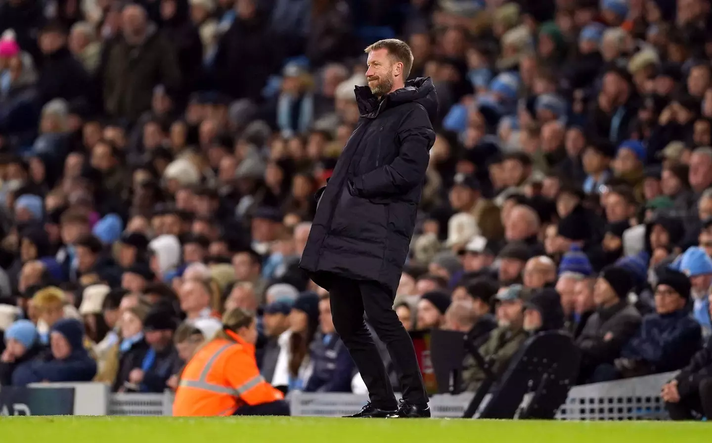 Graham Potter cuts a frustrated figure on the touchline during Manchester City vs. Chelsea. Image: Alamy