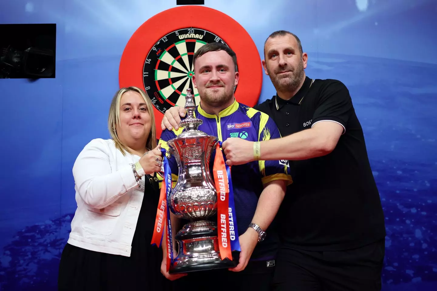 Luke Littler's mum has hit out at 'vile t**ts' after her son was booed. Image: Getty