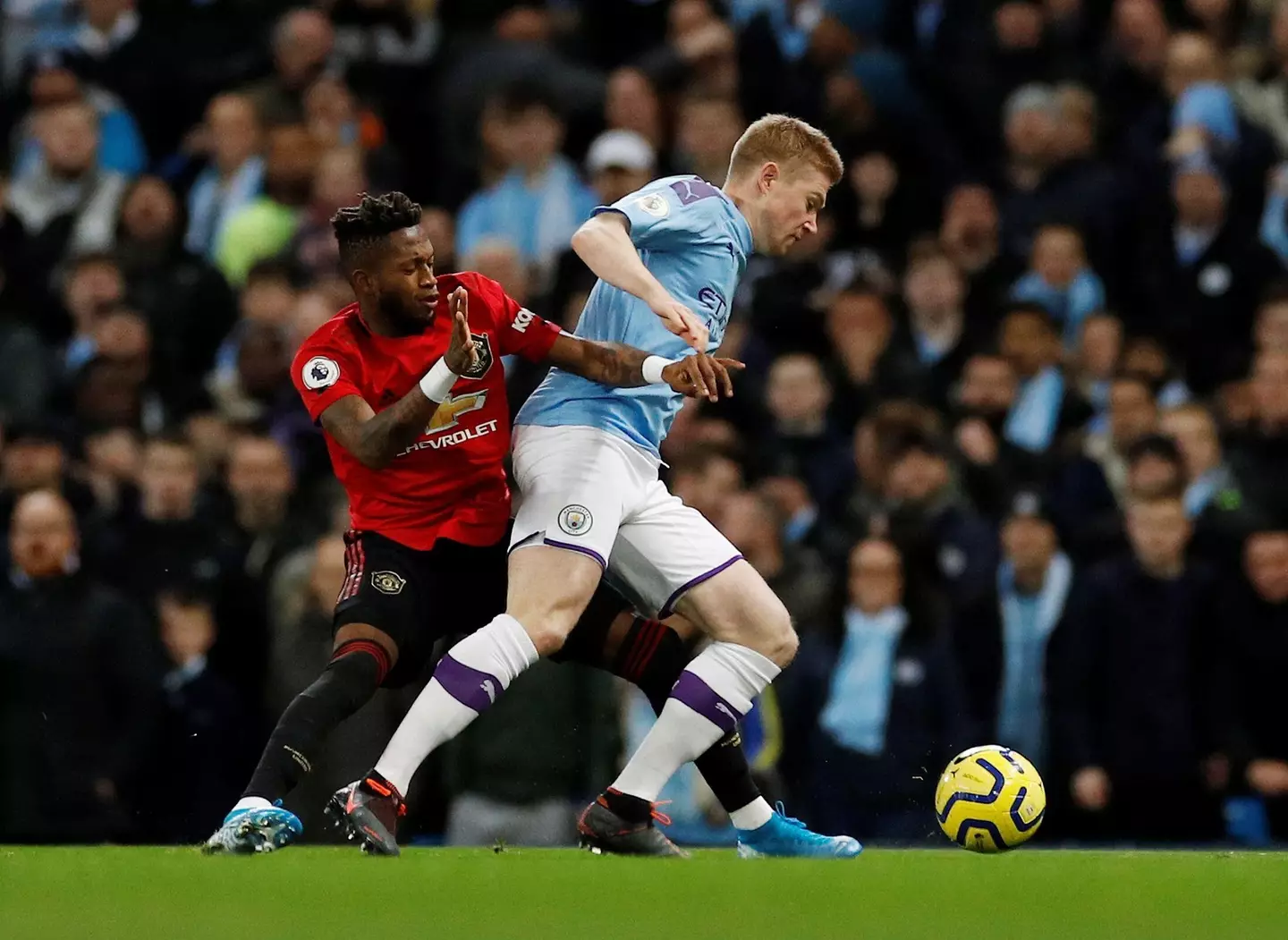 Manchester United's Fred battles against Manchester City's Kevin de Bruyne 
