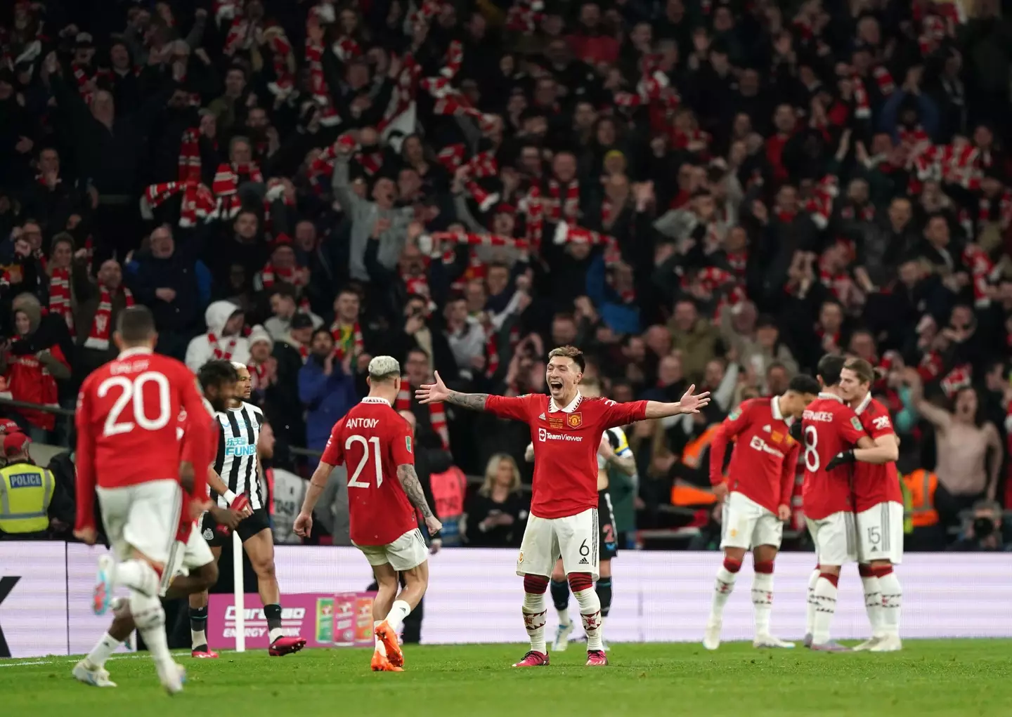 Antony and Martinez celebrate at the final whistle. Image: Alamy