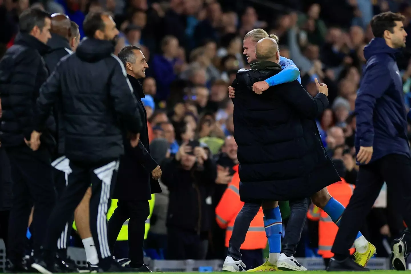 Pep Guardiola, the Manchester City manager, is embraced by Erling Haaland. (Alamy)