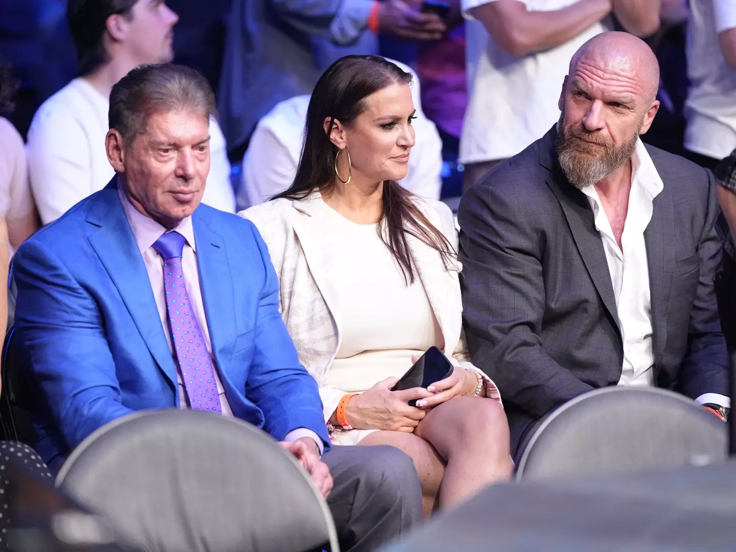 Vince McMahon with Stephanie McMahon and Triple H at a UFC event. Image: Getty