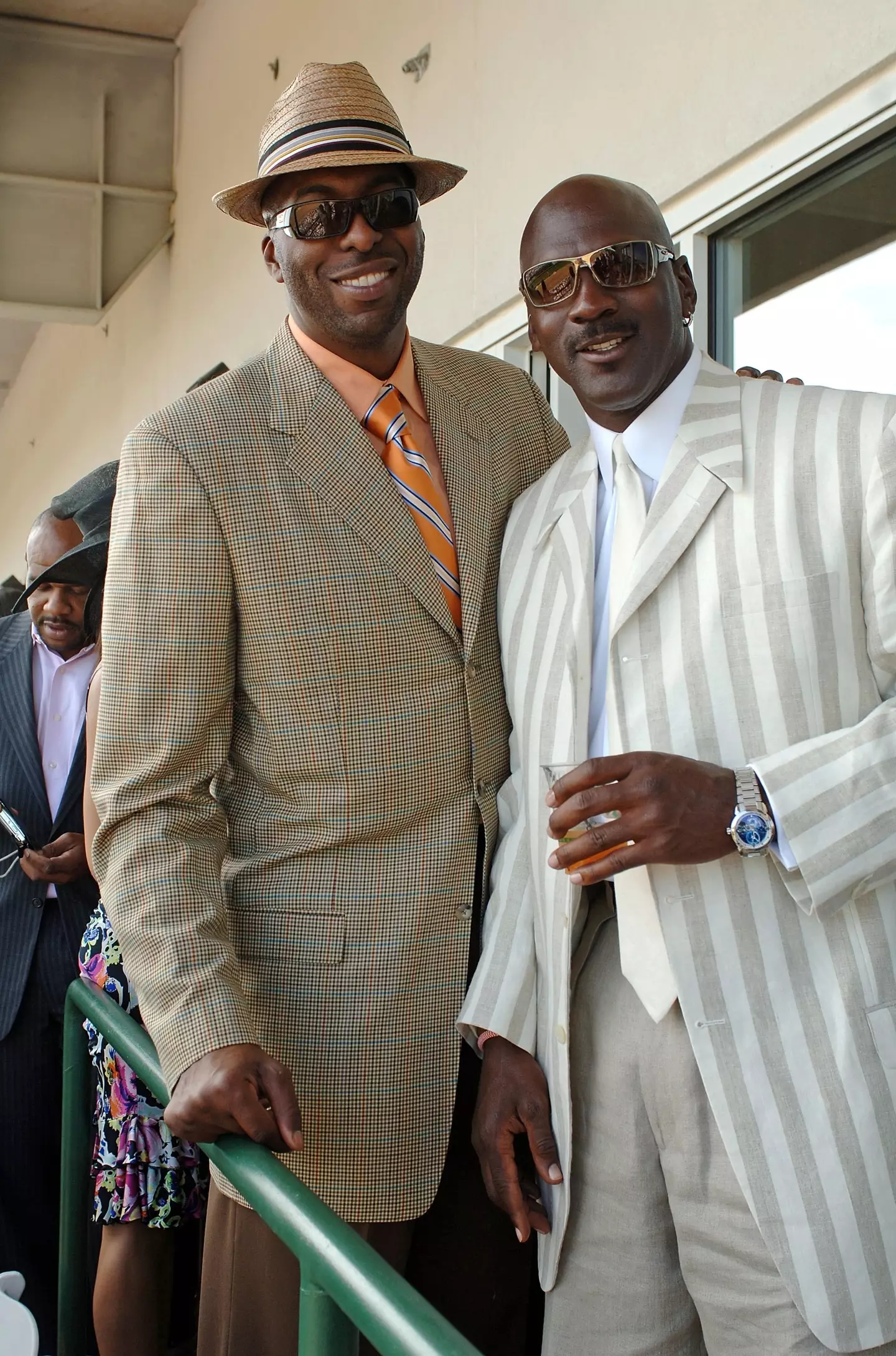 John Salley and Michael Jordan pose in the jockey club at the Kentucky Derby. Image: Getty