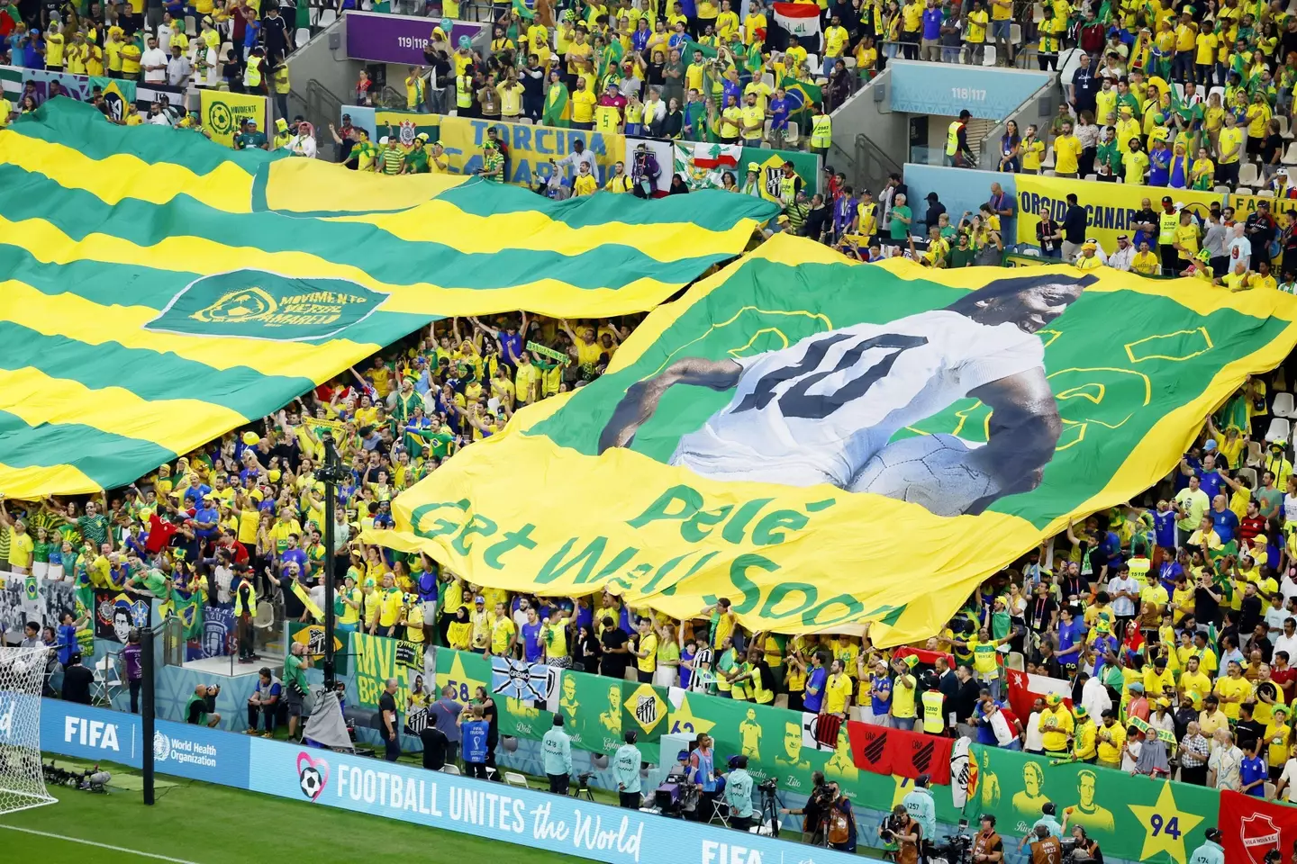 Brazil fans at the World Cup show support for Pele. Image: Alamy