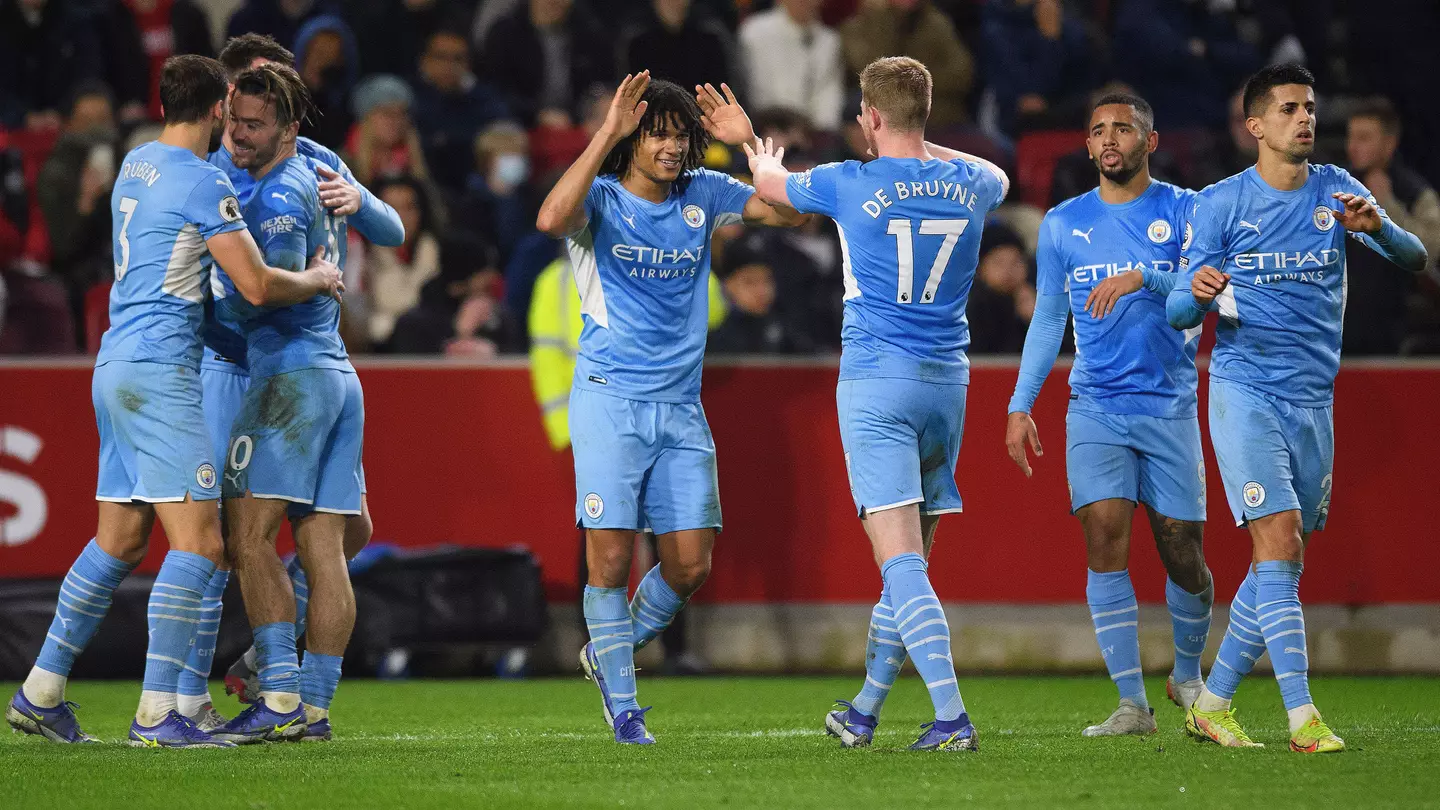 Kevin De Bruyne celebrates the second goal with Nathan Ake during the Premier League victory at the Brentford Community Stadium.