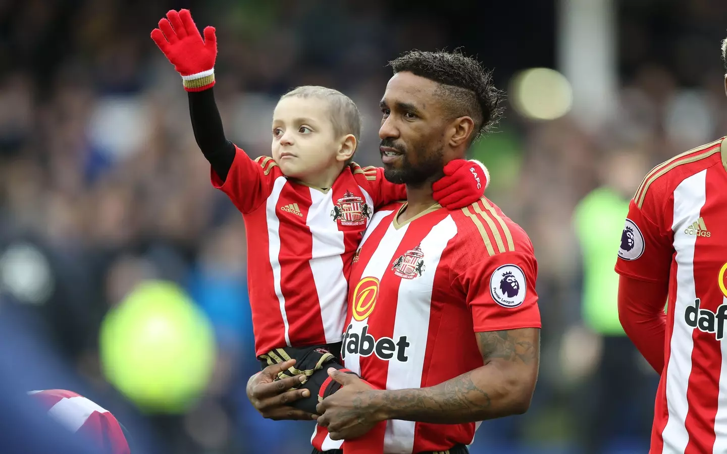 Jermain Defoe with Bradley Lowery.