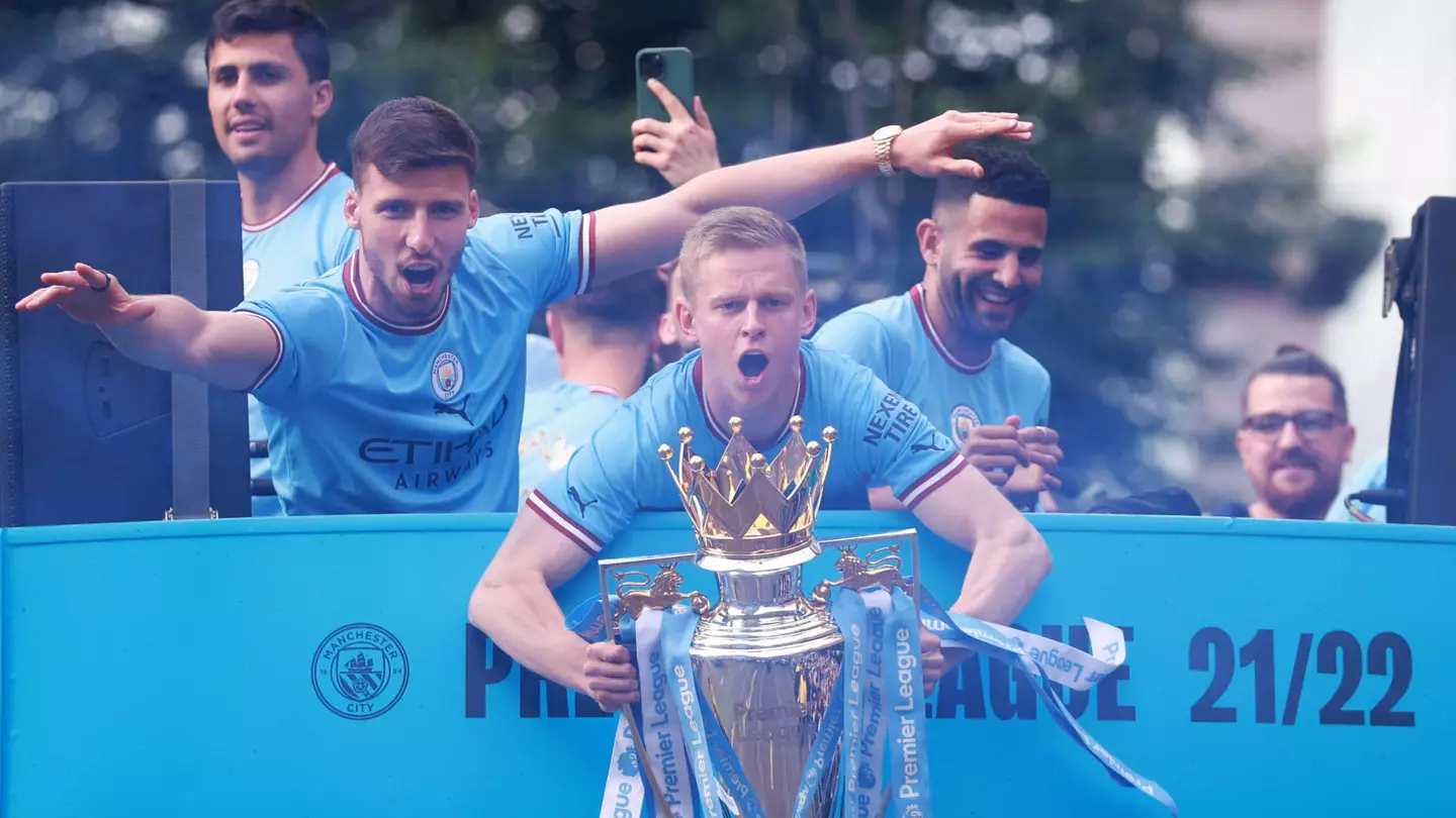 Oleksandr Zinchenko celebrates the Premier League title win for Manchester City.
