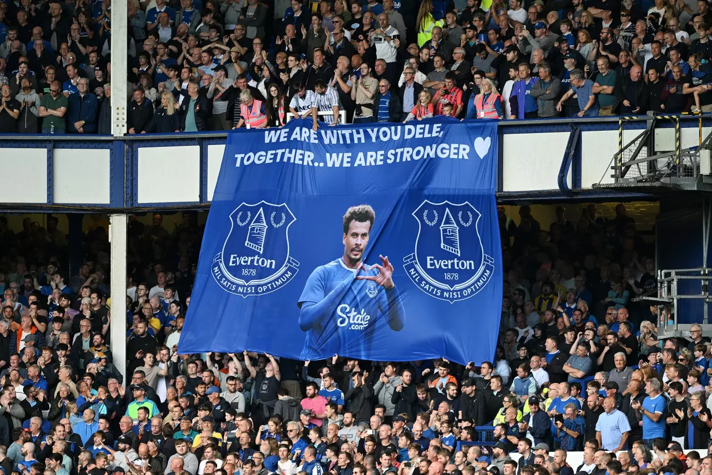 Everton fans reveal a Dele Alli banner at Goodison Park. Image: Getty