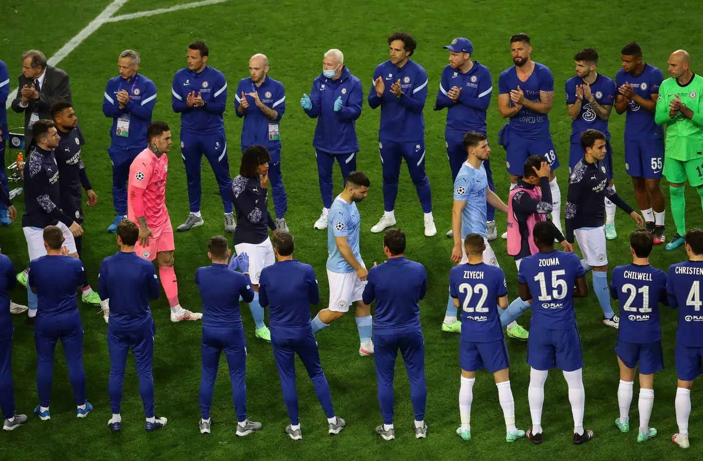 Ruben Dias and his teammates walk through Chelsea's guard of honour after losing the Champions League final. Image: Alamy