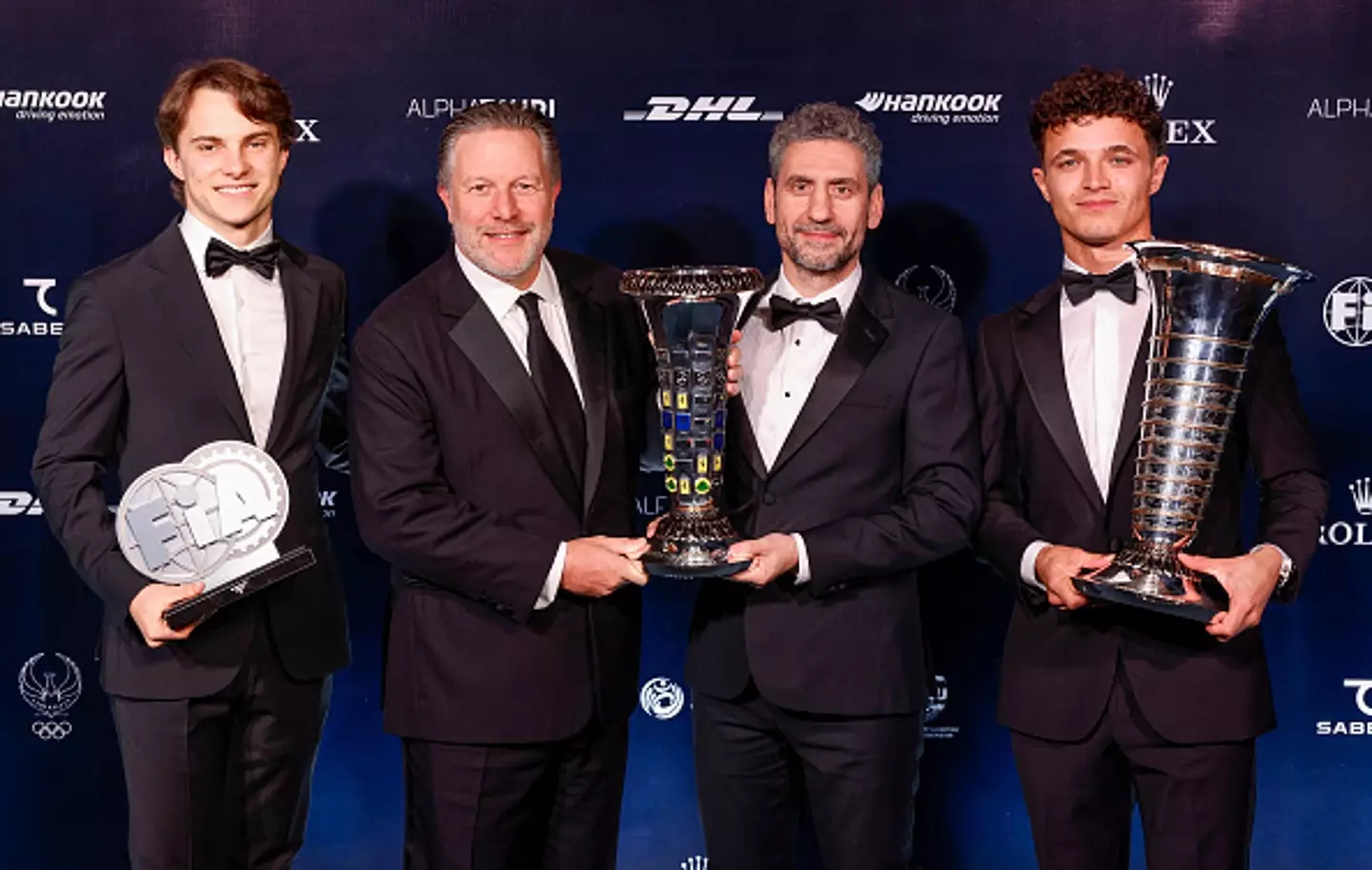 Piastri and Norris pictured alongside McLaren CEO Zak Brown and team principal Andrea Stella (Image: Getty)
