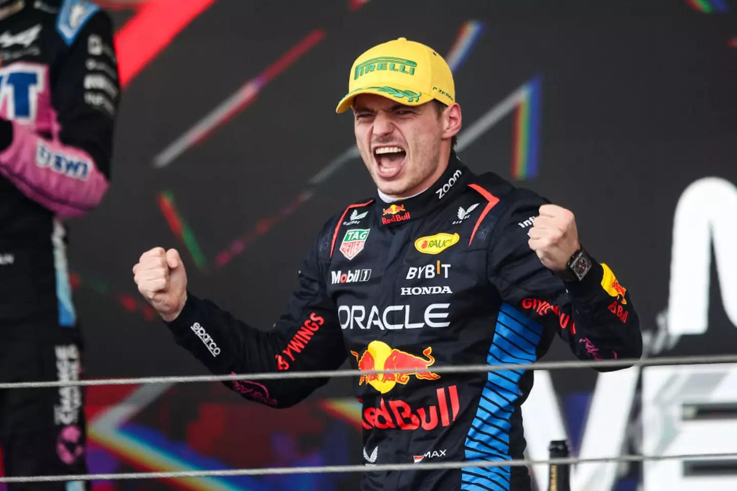 Max Verstappen celebrates on the podium after winning the 2024 Brazilian GP (Image: Getty)