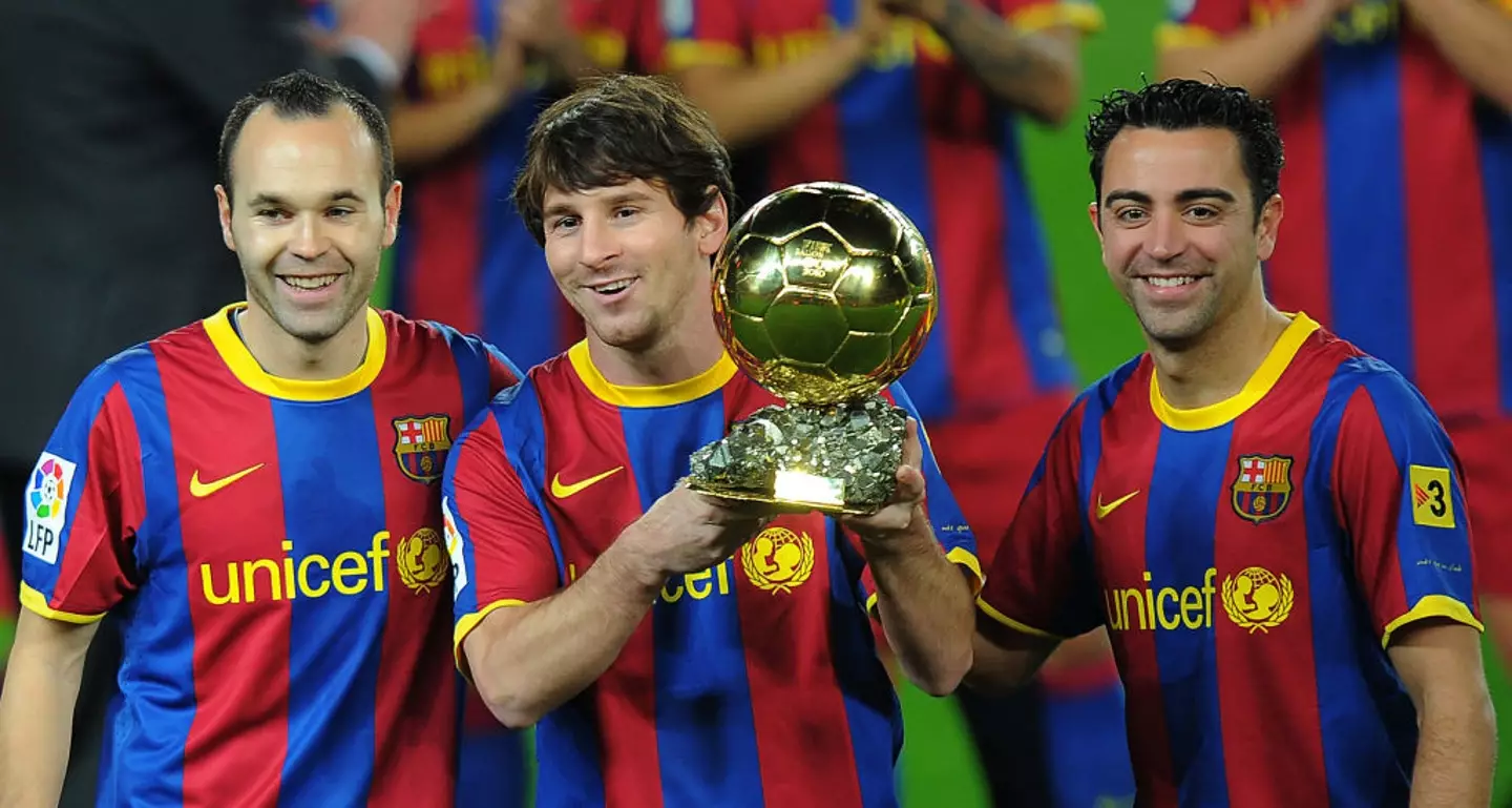 Andres Iniesta, Lionel Messi and Xavi with the 2010 Ballon d'Or (Credit:Getty)