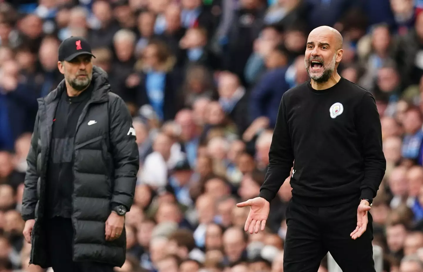 Pep Guardiola claims Liverpool fans threw coins at him during the match (Image: Alamy)