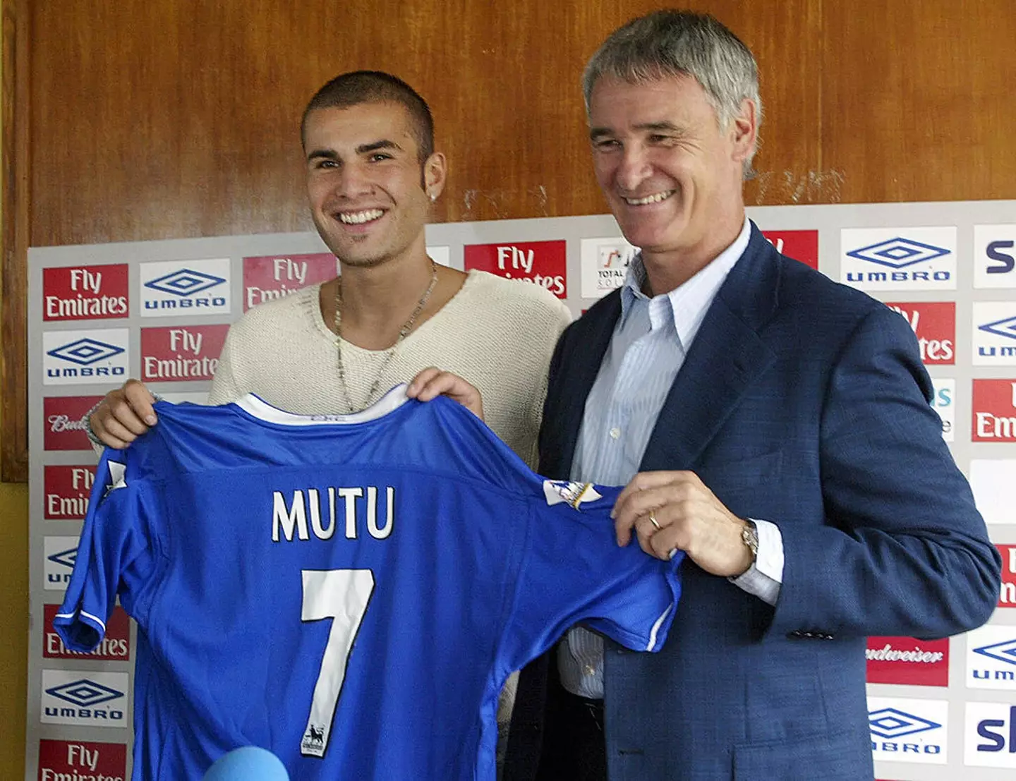 Adrian Mutu is announced as a new Chelsea player alongside manager Claudio Ranieri in 2003 -