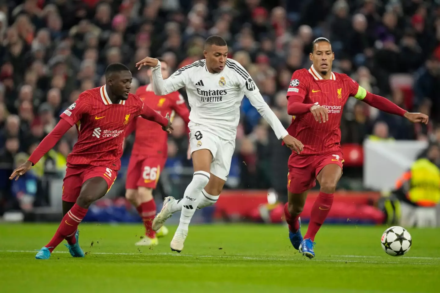 Van Dijk (right) is set to sign a new deal with Liverpool (Image: Getty)