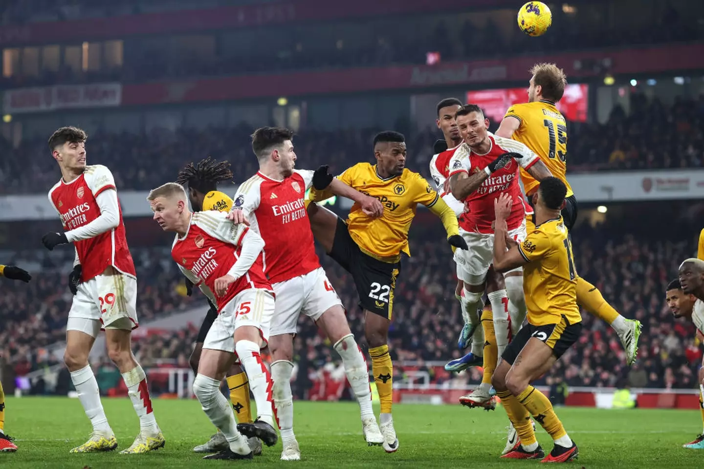 Arsenal players contest a corner -